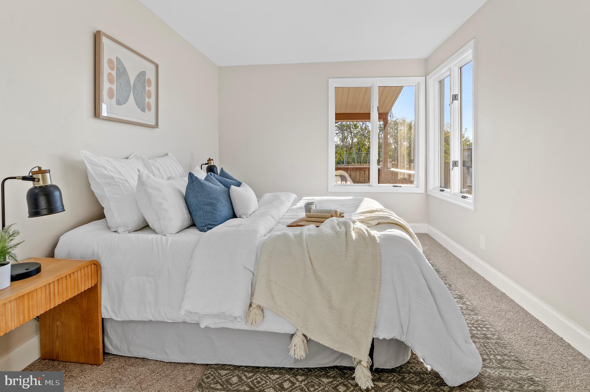 1237 Willow Road Dundalk, MD 21222 - Photo 21 of 29 a bedroom with a bed and a window