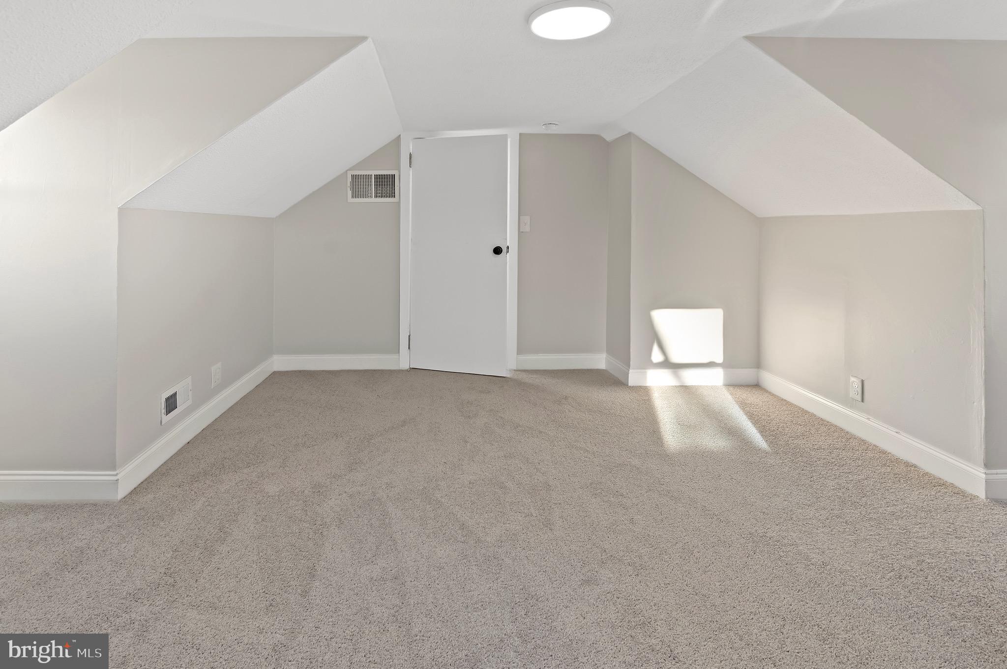 1237 Willow Road Dundalk, MD 21222 - Photo 27 of 29 a view of empty room with wooden floor
