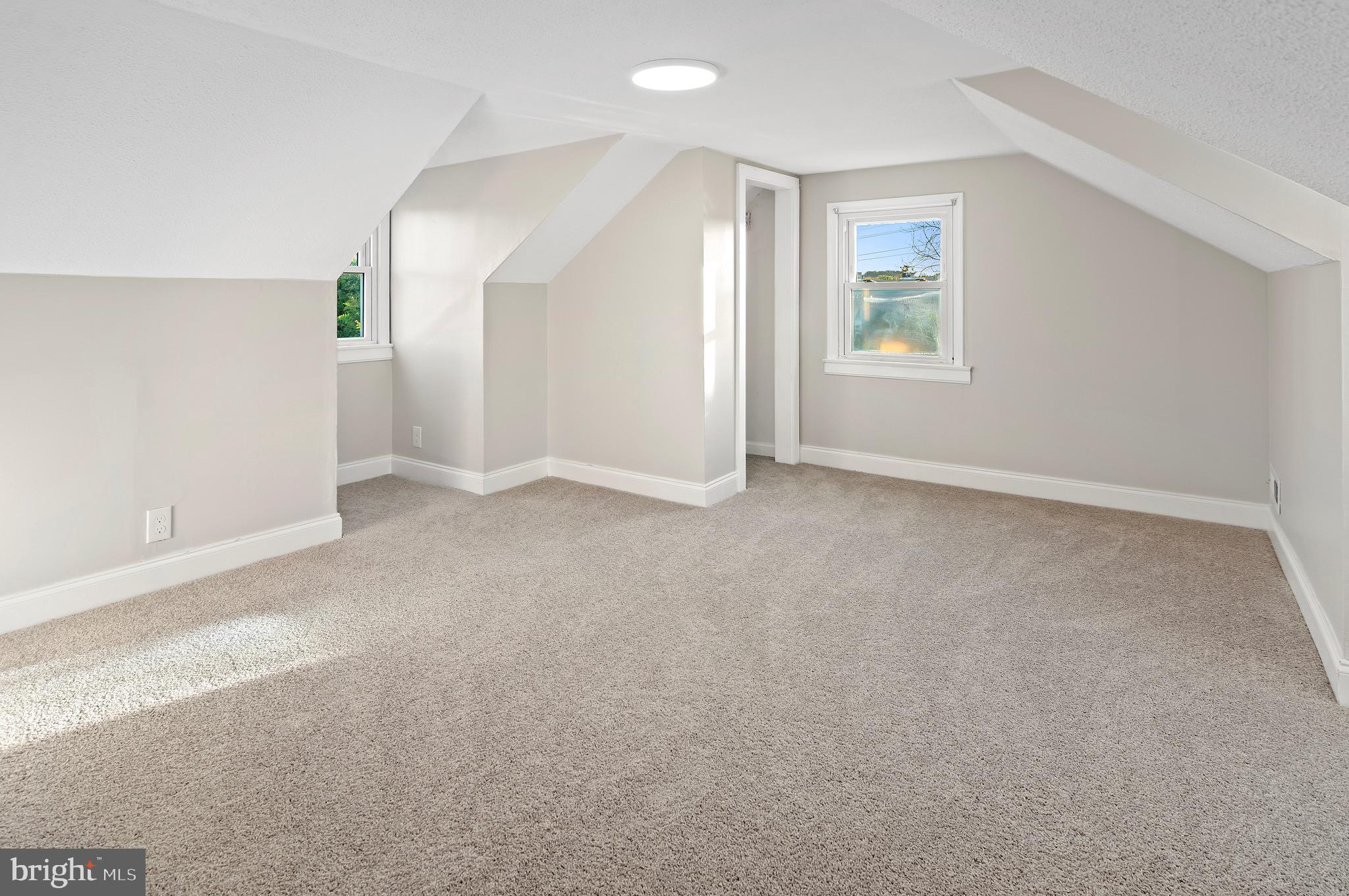 1237 Willow Road Dundalk, MD 21222 - Photo 29 of 29 an empty room with windows and closet