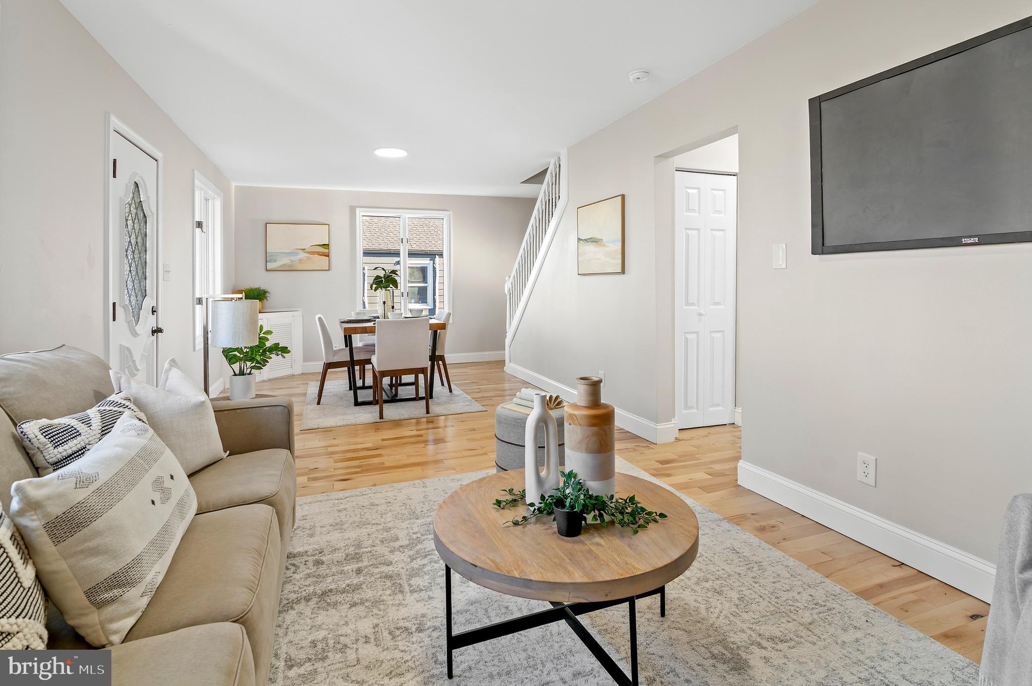 1237 Willow Road Dundalk, MD 21222 - Photo 9 of 29 a living room with furniture and a wooden floor