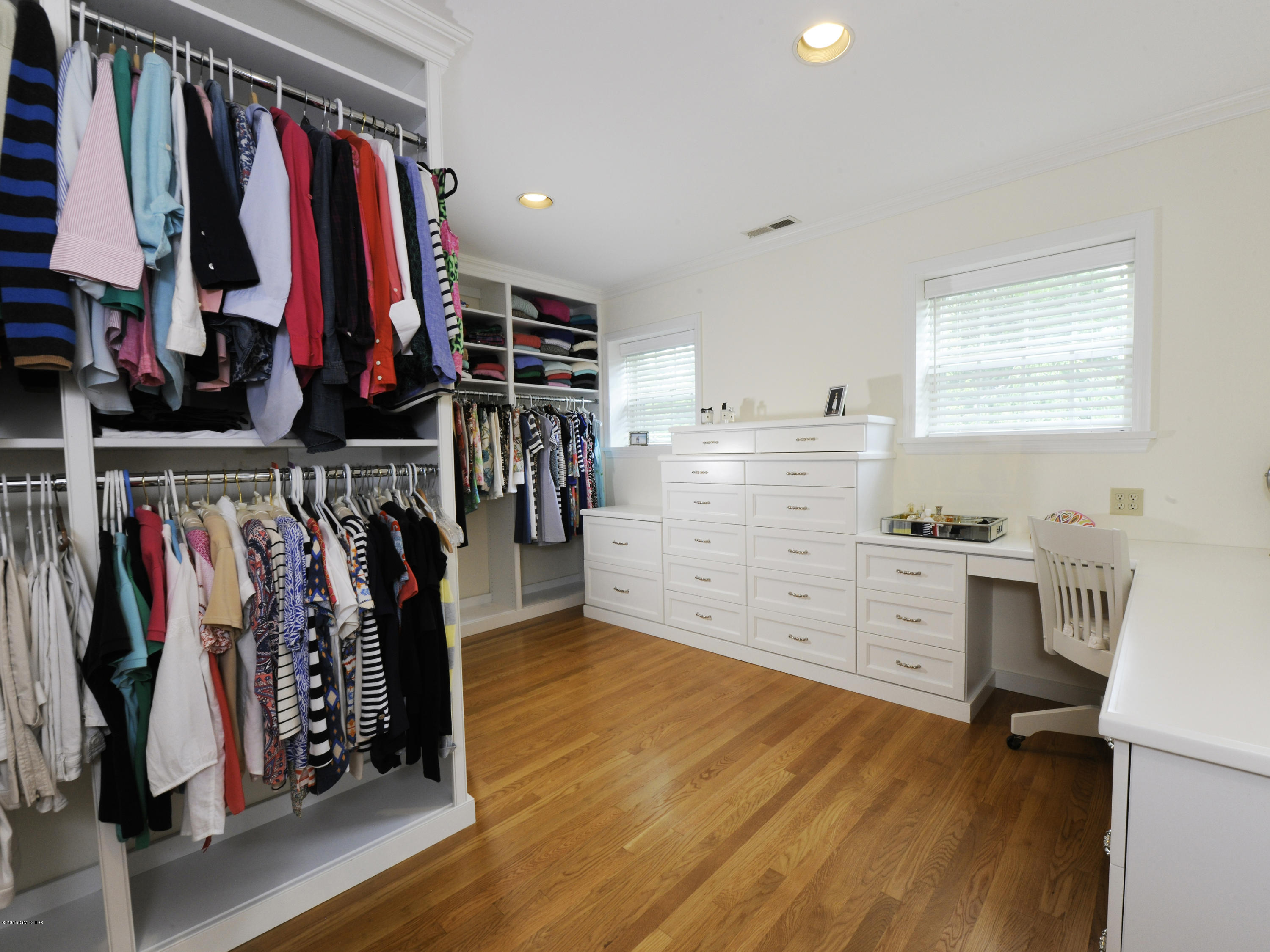 9 Palmer Lane Riverside, CT 06878 - Photo 13 of 29 a view of walk in closet with clothes