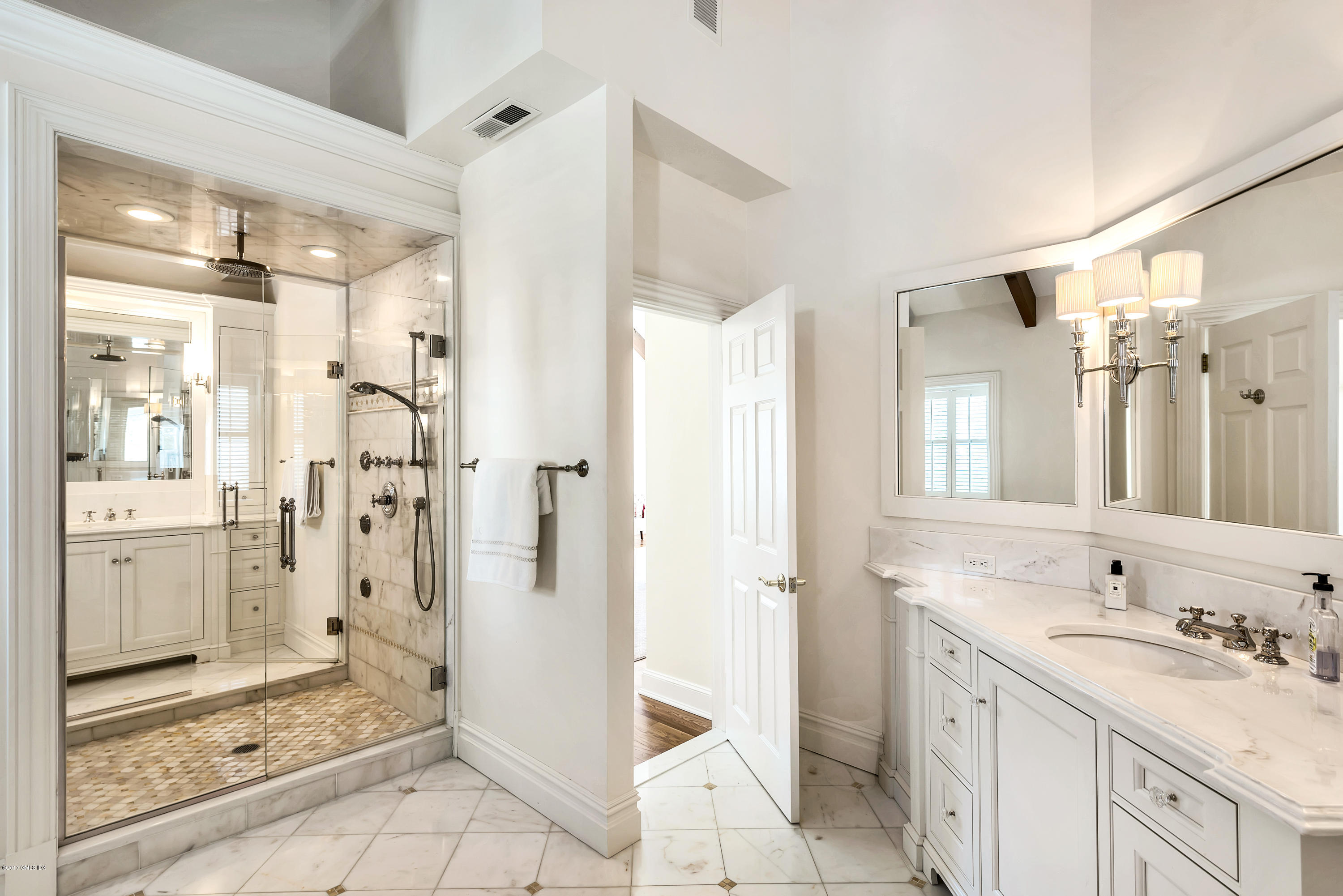 9 Palmer Lane Riverside, CT 06878 - Photo 14 of 29 a bathroom with a sink a toilet and shower