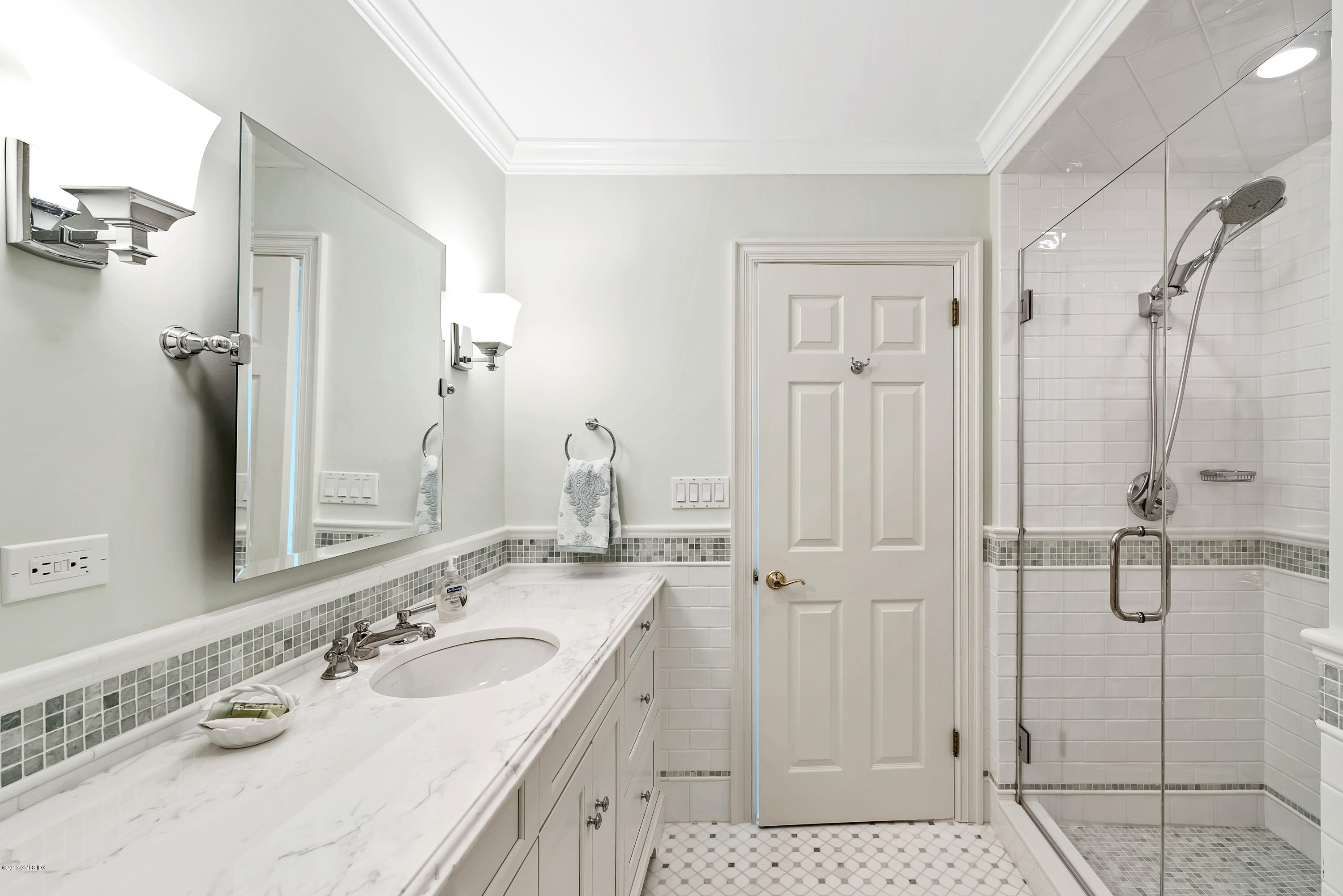 9 Palmer Lane Riverside, CT 06878 - Photo 18 of 29 a bathroom with a double vanity sink mirror and shower