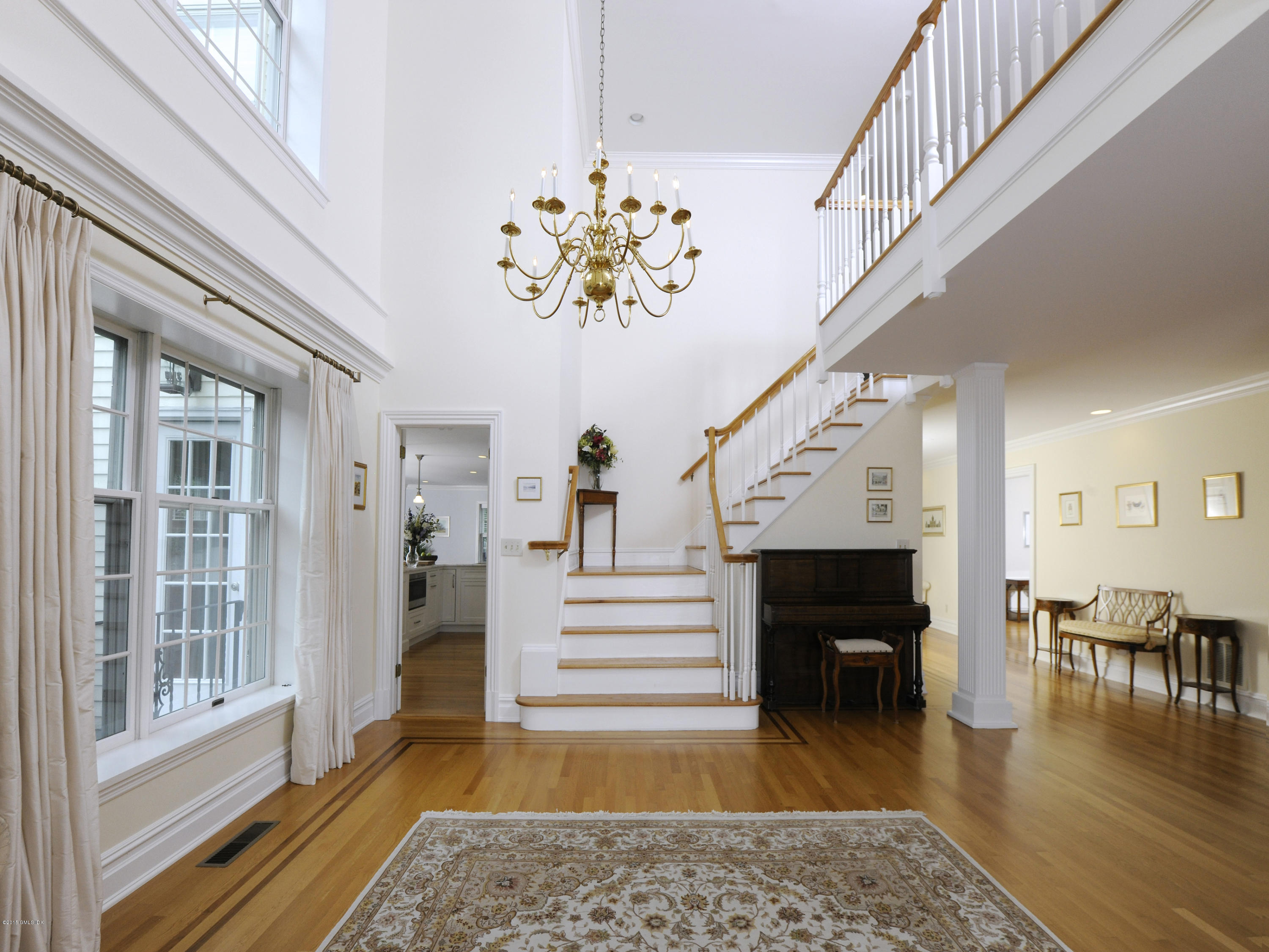 9 Palmer Lane Riverside, CT 06878 - Photo 8 of 29 a view of entryway and hall with wooden floor