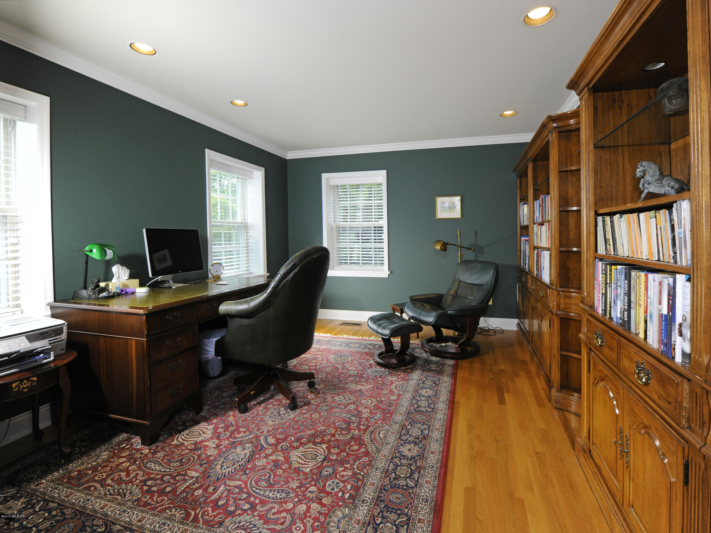 9 Palmer Lane Riverside, CT 06878 - Photo 10 of 29 a living room with furniture window and a flat screen tv