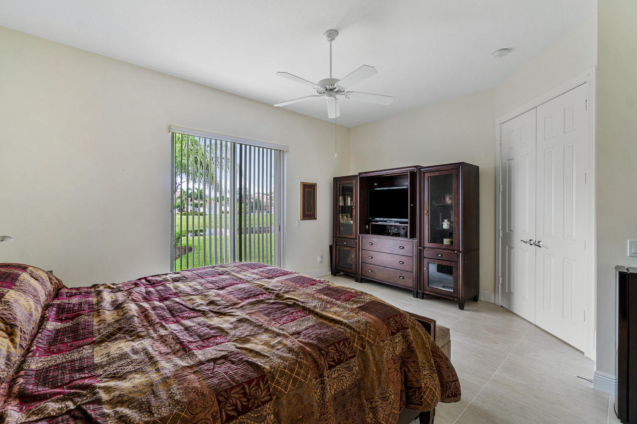 10898 Southwest Candlewood Road Port St. Lucie, FL 34987 - Photo 15 of 41 Master Bedroom