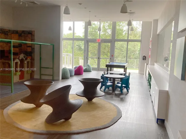 a sitting area with chairs