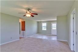 376 Howell Hill Road Kelso, TN 37348 - Photo 3 of 13 a view of a room with a ceiling fan and a window