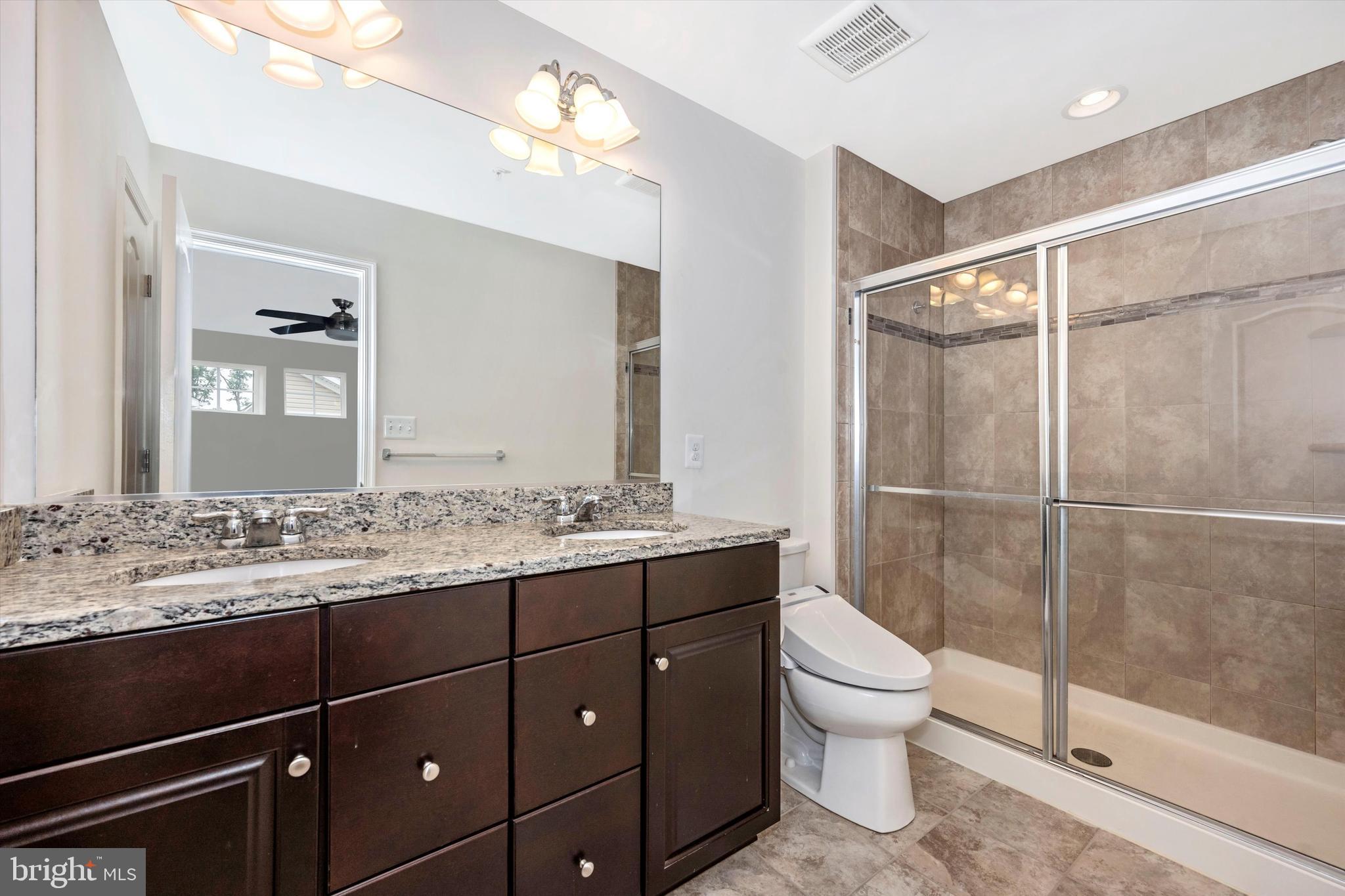 1041 Ramble Run Road Middle River, MD 21220 - Photo 22 of 56 Owners Bath with Double sink Tile Shower