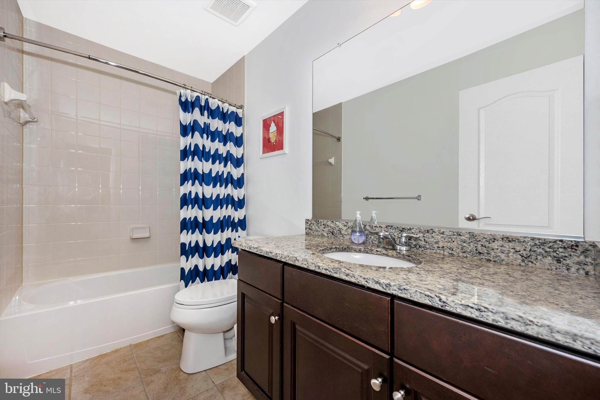 1041 Ramble Run Road Middle River, MD 21220 - Photo 25 of 56 Guest Bath with Tile Shower/Double Sinks