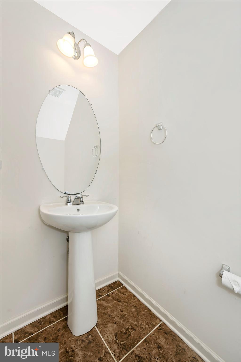 1041 Ramble Run Road Middle River, MD 21220 - Photo 29 of 56 Lower Lever 1/2 Bath off of Foyer