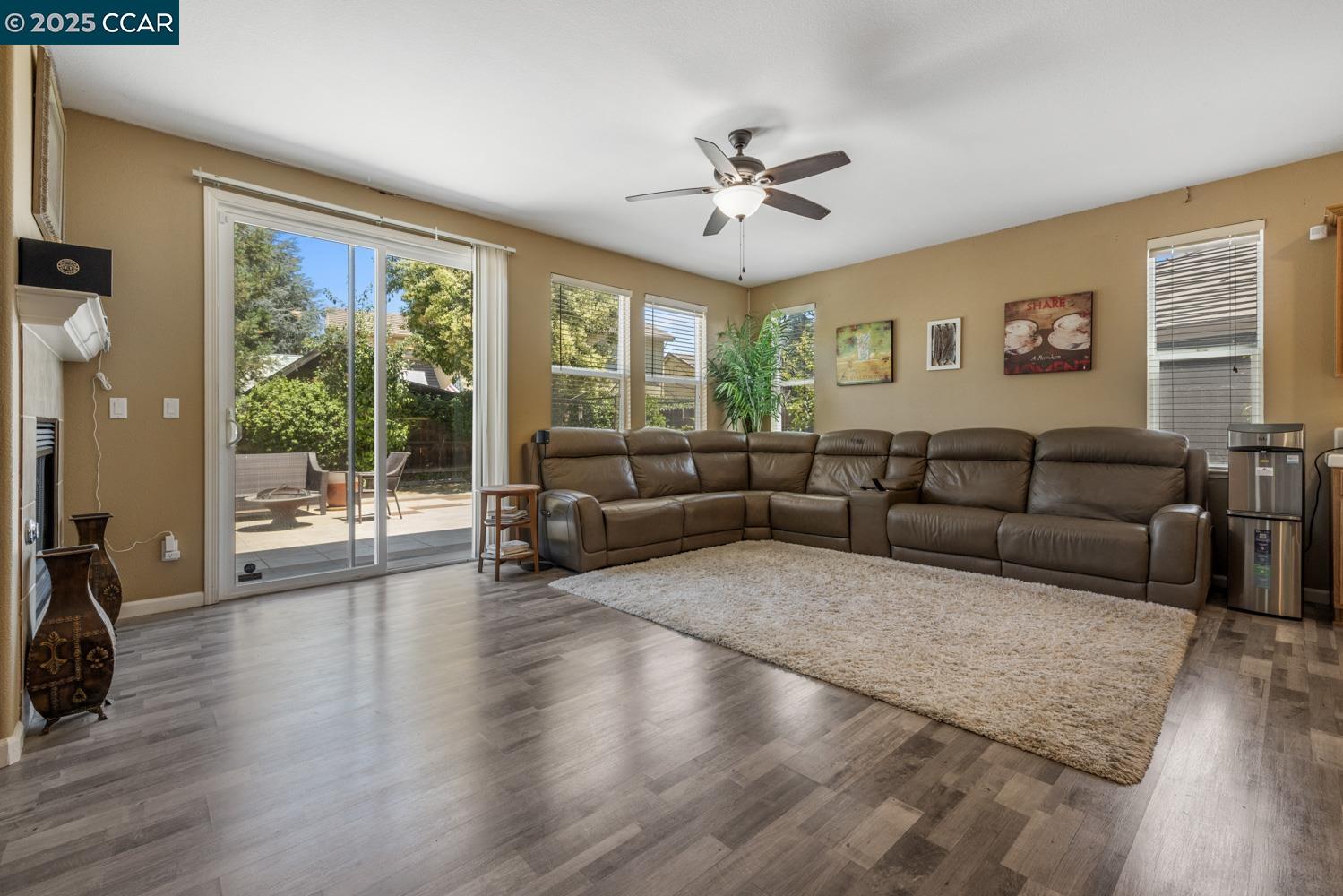 1117 Van Gogh Lane Patterson, CA 95363 - Photo 13 of 55 a living room with furniture and a large window