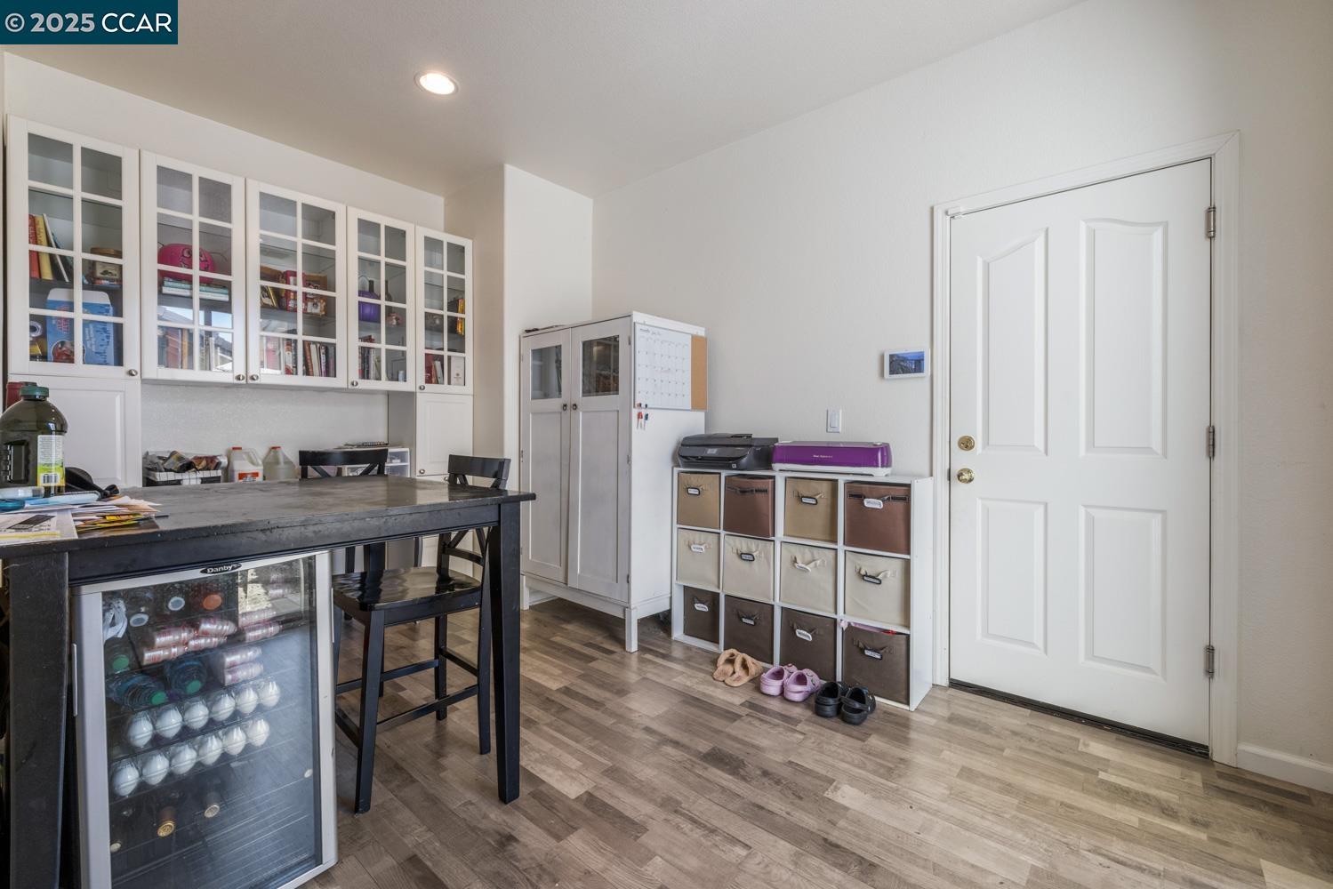 1117 Van Gogh Lane Patterson, CA 95363 - Photo 21 of 55 a view of livingroom with furniture and wooden floor