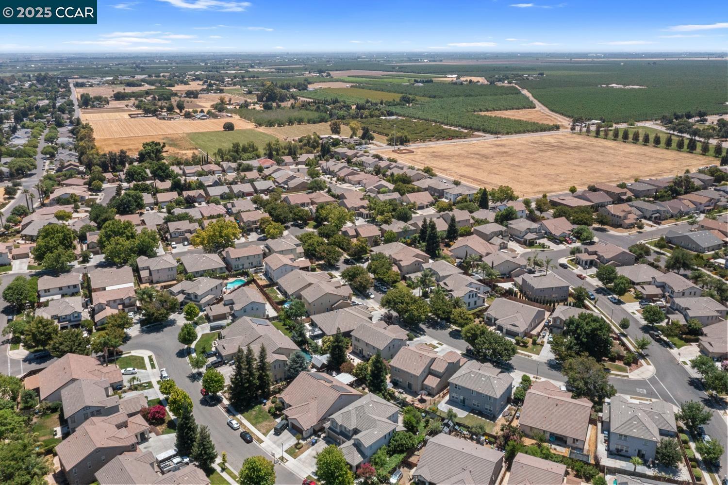 1117 Van Gogh Lane Patterson, CA 95363 - Photo 50 of 55 an aerial view of residential building and ocean
