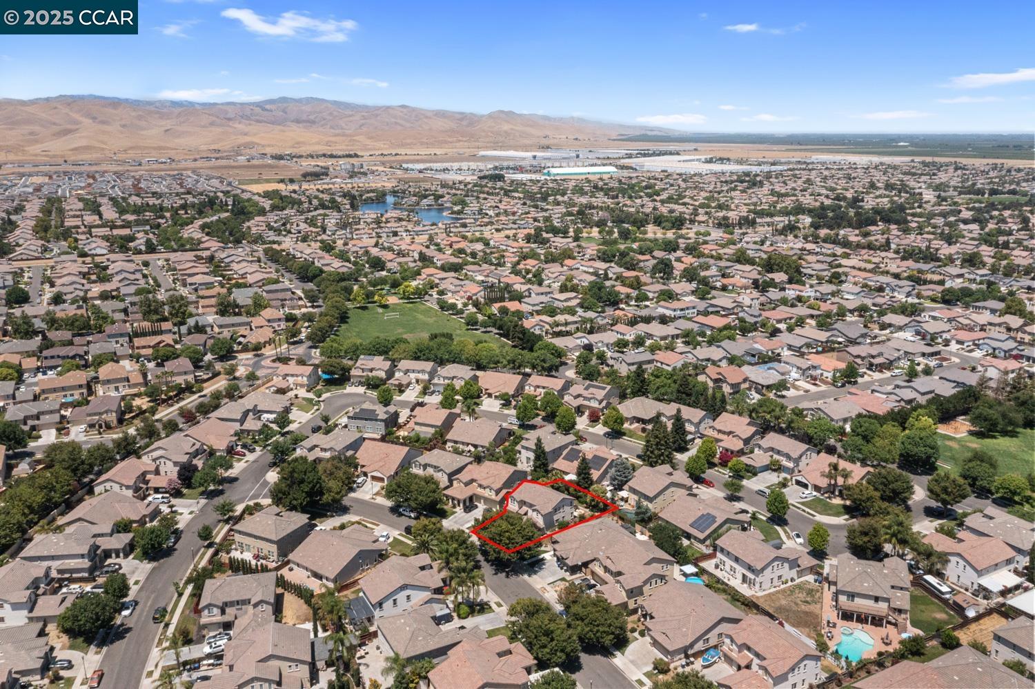 1117 Van Gogh Lane Patterson, CA 95363 - Photo 54 of 55 an aerial view of residential houses with city view