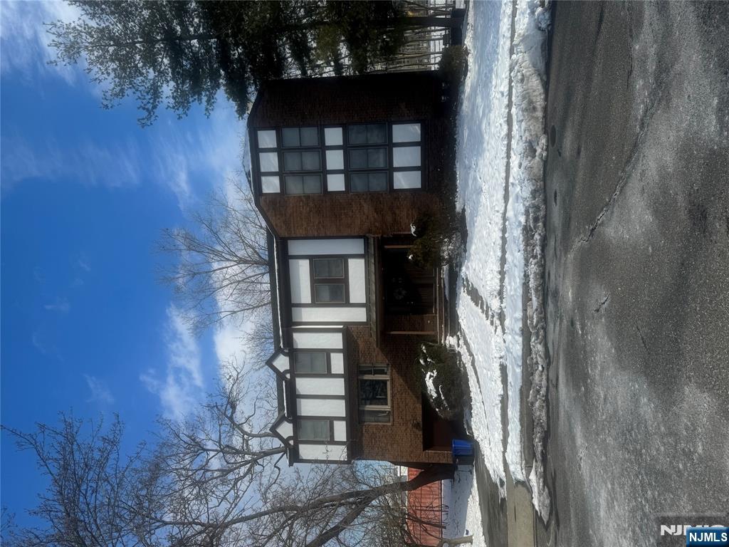 39-1 Smith Street Waldwick, NJ 07463 - Photo 36 of 37 front view of a house with a yard