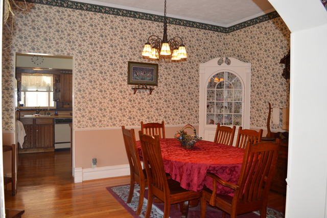 107 Lawton Road Riverside, IL 60546 - Photo 5 of 17 a view of a dining room with furniture and wooden floor