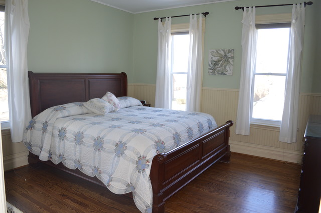 107 Lawton Road Riverside, IL 60546 - Photo 10 of 17 a bedroom with a bed and window