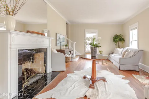 a living room with furniture and a window