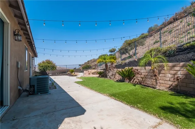 a view of a backyard with plants