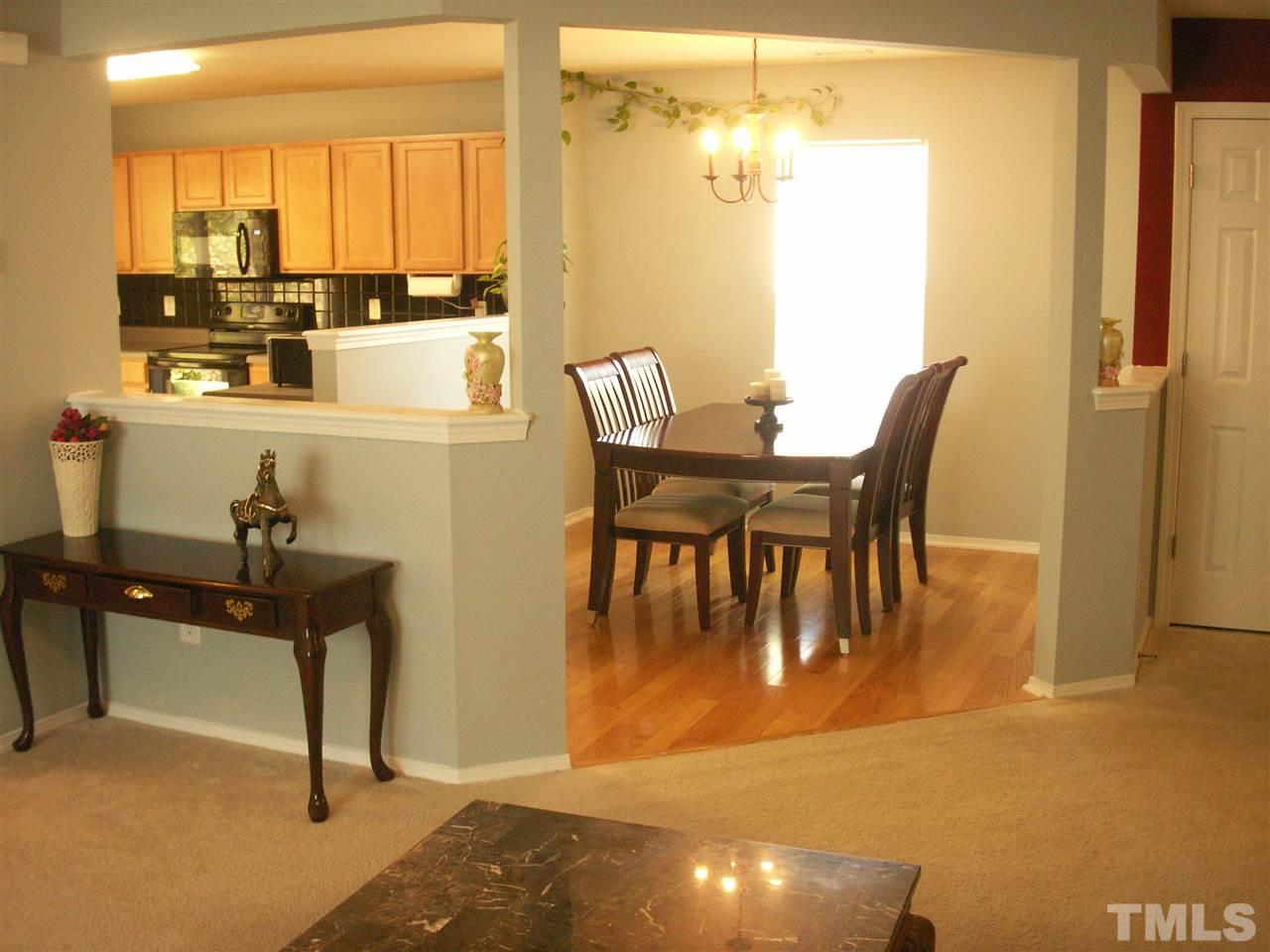 3129 Varcroft Road Knightdale, NC 27545 - Photo 7 of 25 a dining room with furniture and a table