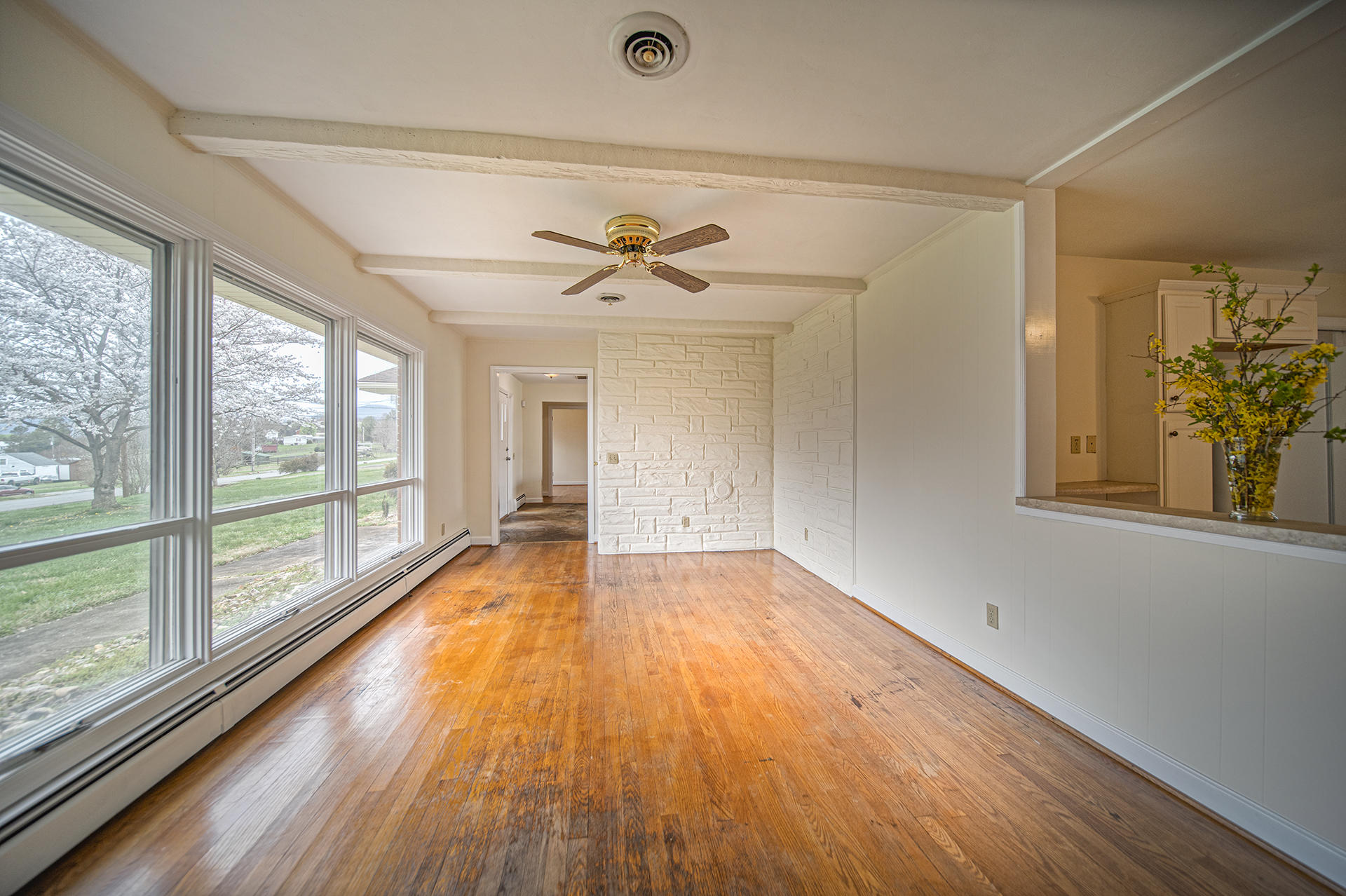 1087 Ross Road Vinton, VA 24179 - Photo 9 of 24 wooden floor in an empty room with a window