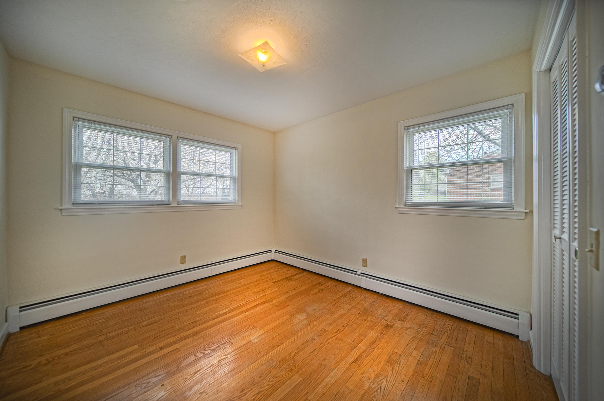 1087 Ross Road Vinton, VA 24179 - Photo 15 of 24 a view of a room with wooden floor and windows
