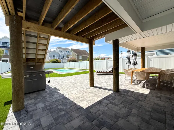 a view of a house with a patio