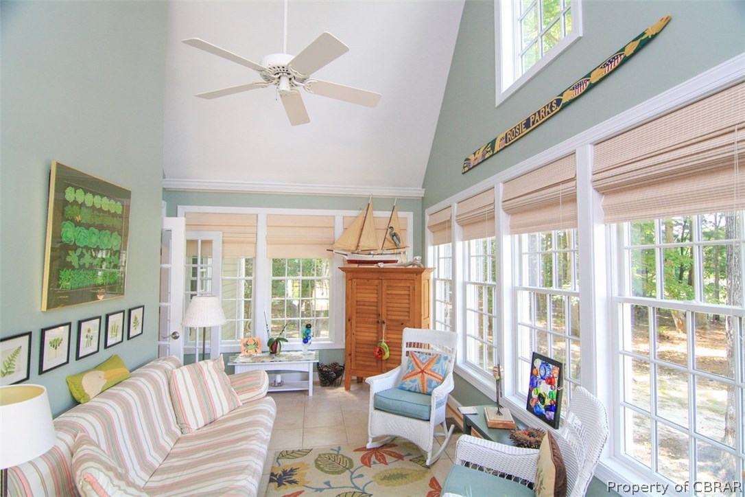 98 Flood Point Road Heathsville, VA 22473 - Photo 22 of 44 Sunroom - Walls of glass bring the outside light and views right into the house
