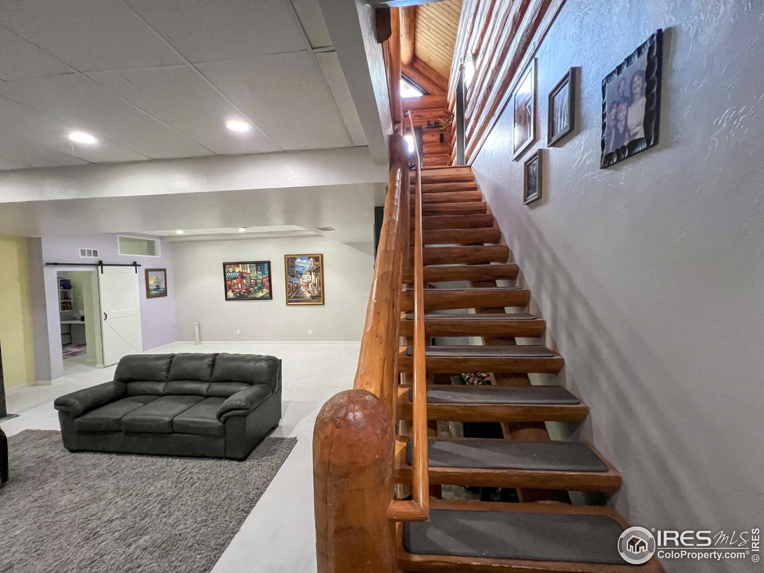 27667 Buckhorn Road Bellvue, CO 80512 - Photo 14 of 40 a view of entryway and hall