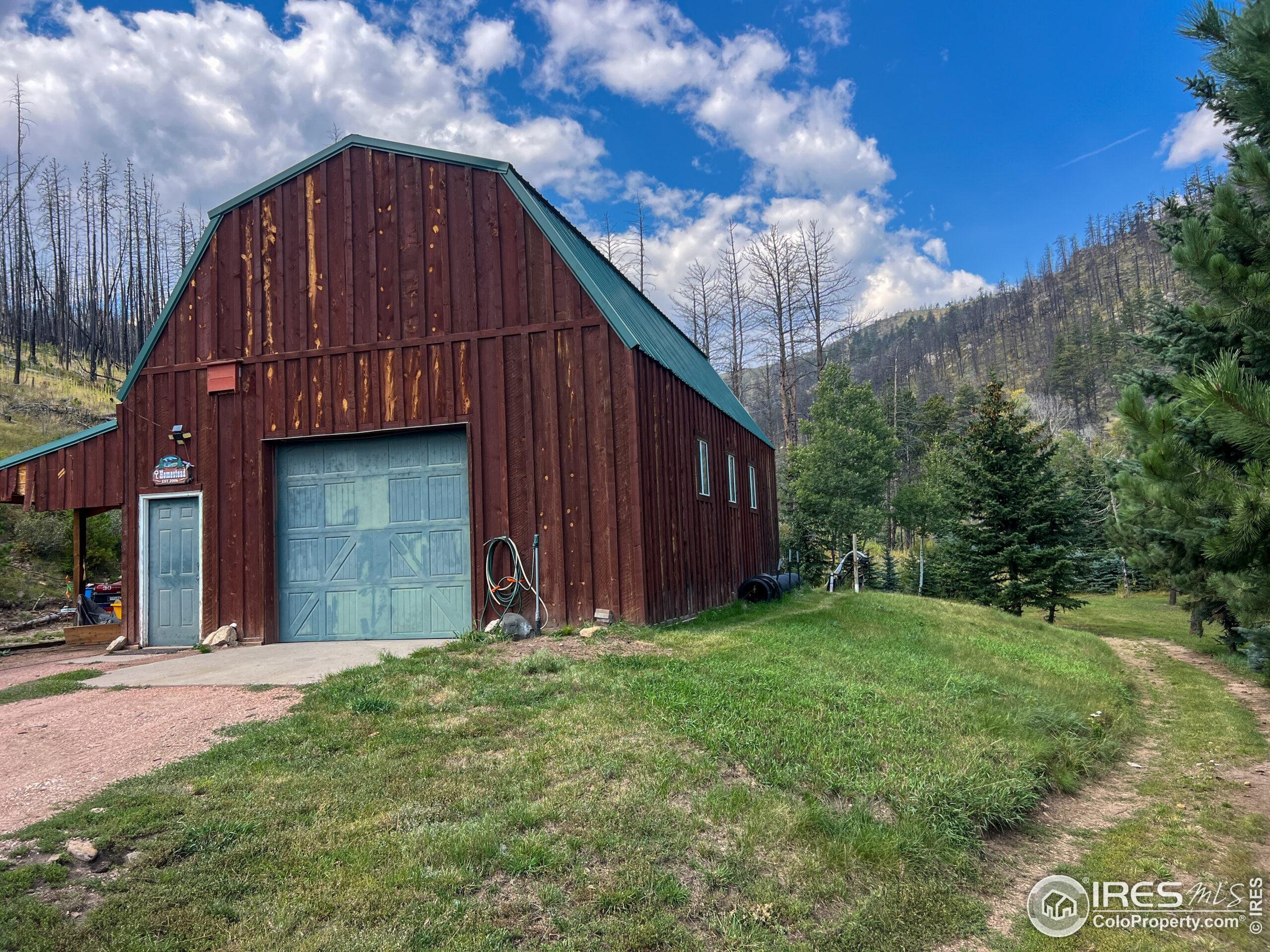 27667 Buckhorn Road Bellvue, CO 80512 - Photo 39 of 40 a view of a small house
