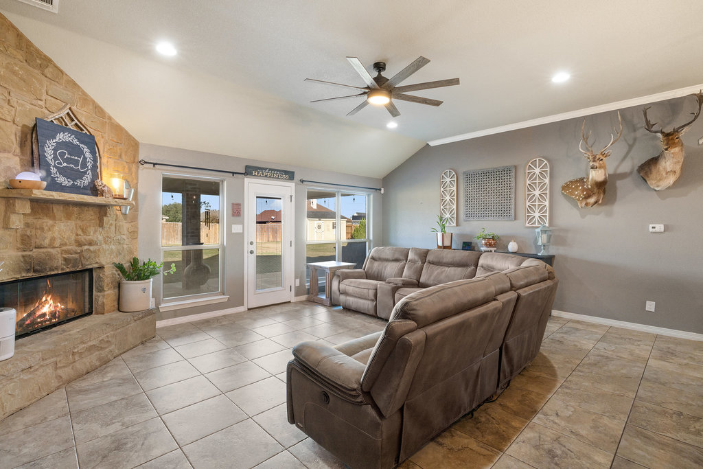 153 Ranger Boulevard Salado, TX 76571 - Photo 15 of 40 a living room with furniture and a fireplace