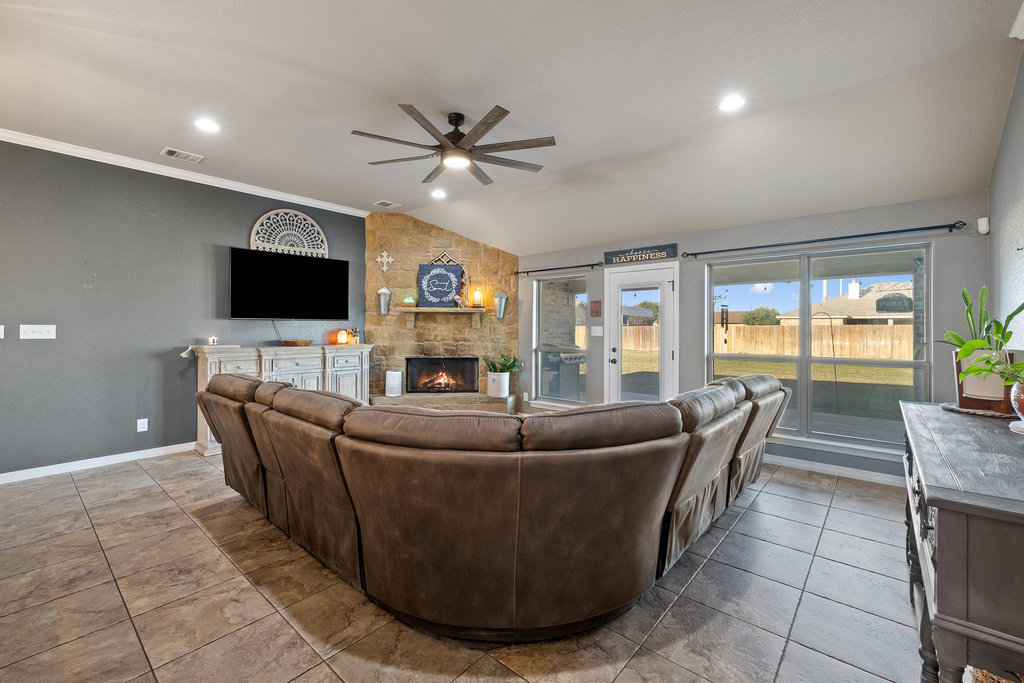 153 Ranger Boulevard Salado, TX 76571 - Photo 17 of 40 a living room with furniture and a flat screen tv
