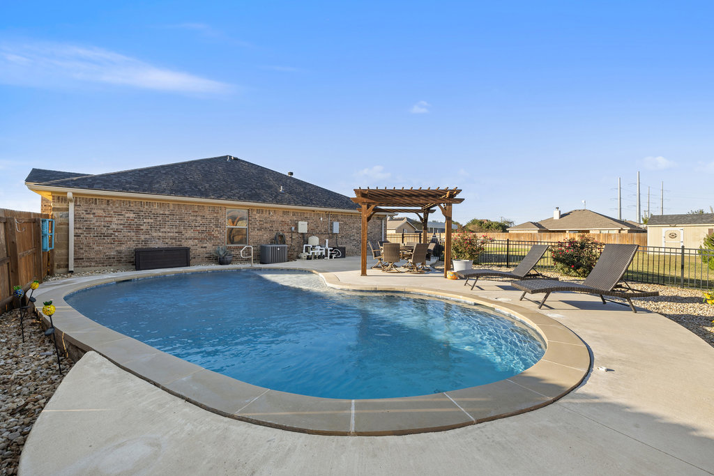 153 Ranger Boulevard Salado, TX 76571 - Photo 37 of 40 a view of a swimming pool with outdoor seating