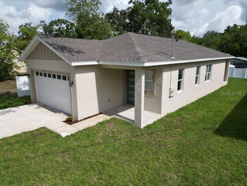 36755 Thomas Jefferson Road Dade City, FL 33525 - Photo 1 of 33 a view of a house with a yard