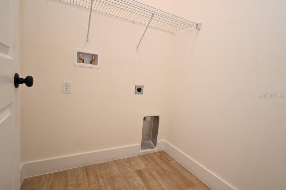 36755 Thomas Jefferson Road Dade City, FL 33525 - Photo 26 of 33 a view of a small space with wooden floor