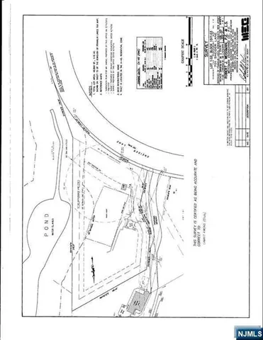 a picture of a room with a white wall and a painting