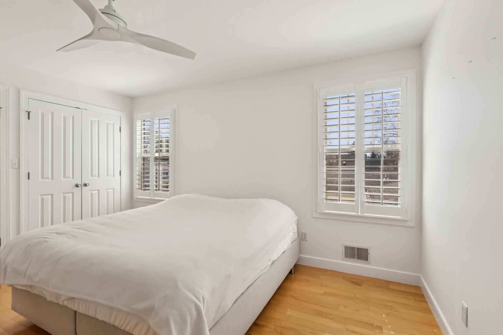 228 South Main Street Pennington, NJ 08534 - Photo 12 of 37 a bedroom with a bed and a window