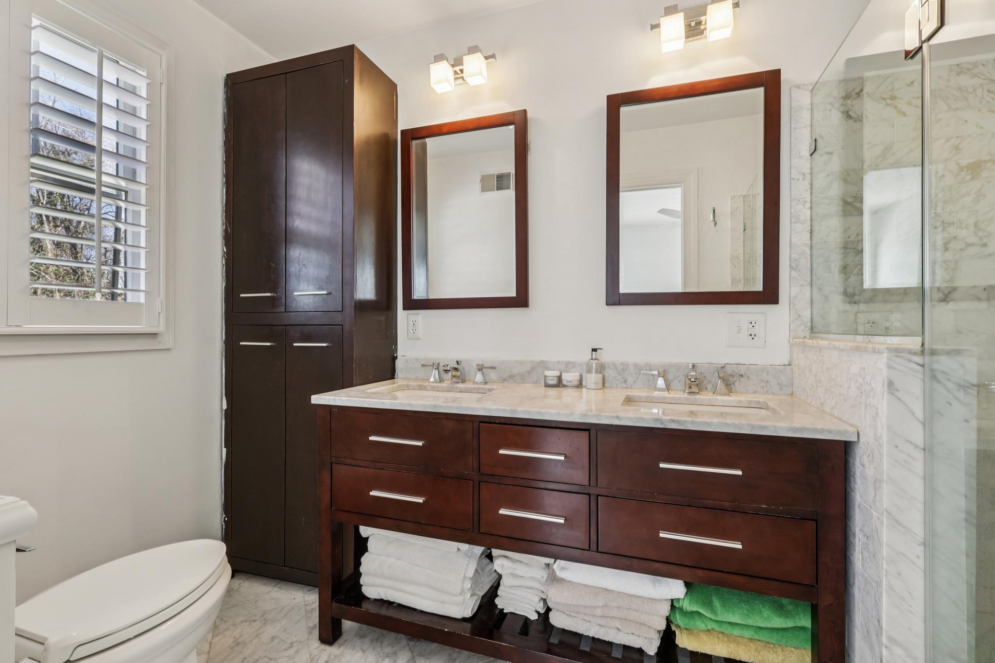 228 South Main Street Pennington, NJ 08534 - Photo 14 of 37 a bathroom with a granite countertop toilet sink and mirror