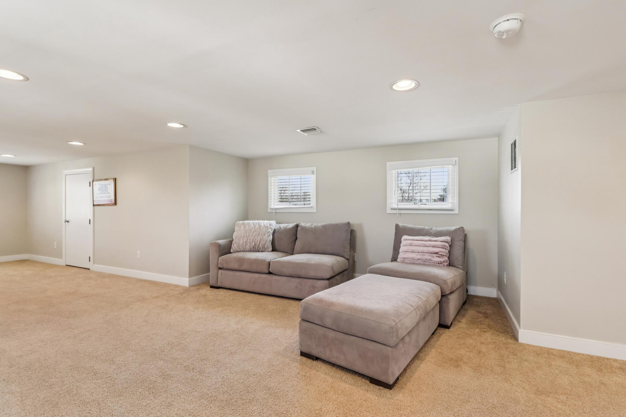 228 South Main Street Pennington, NJ 08534 - Photo 22 of 37 a living room with furniture and a night stand
