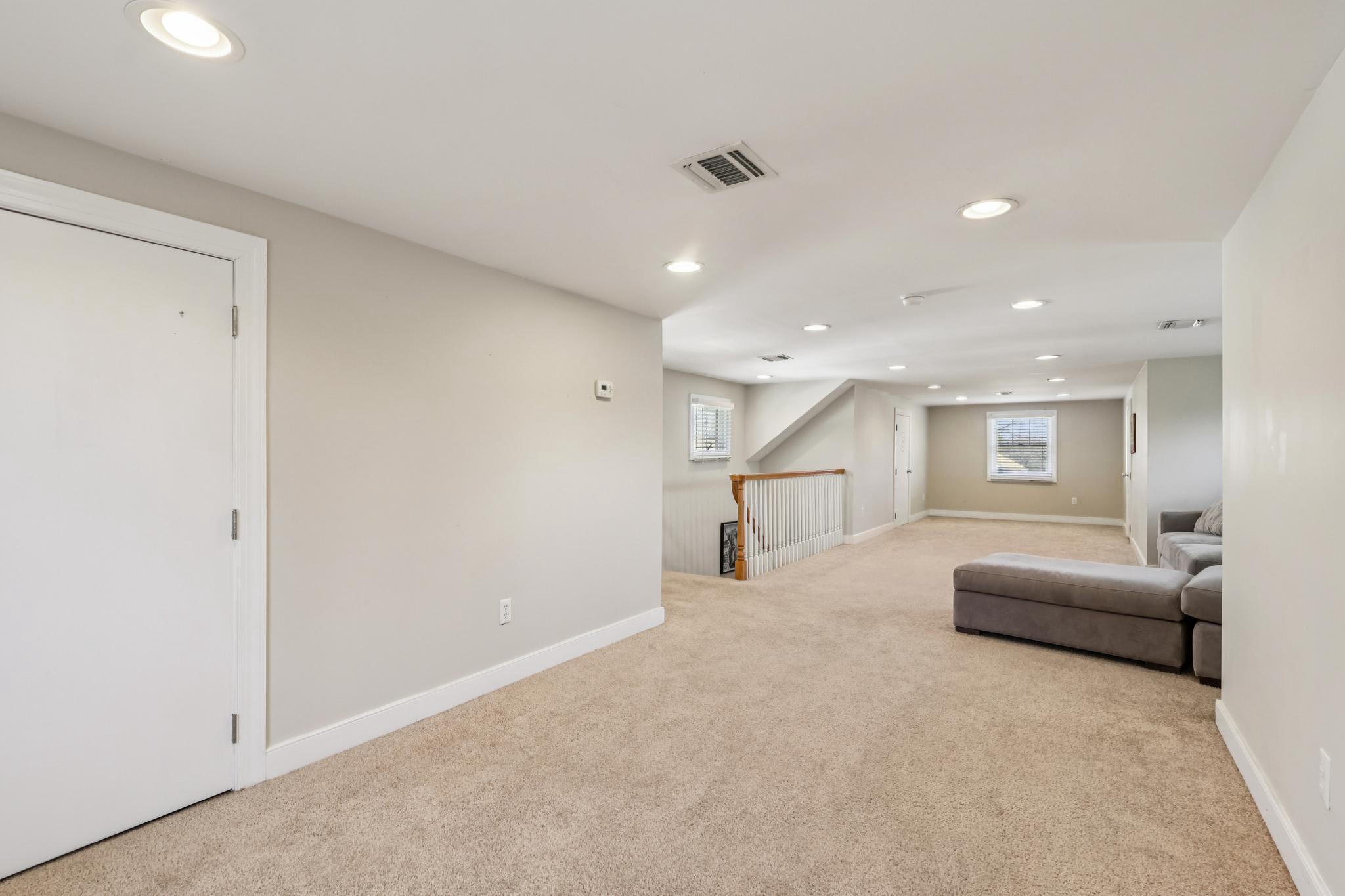228 South Main Street Pennington, NJ 08534 - Photo 23 of 37 a living room with a couch and a couch