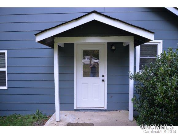 40 Lyle Street Tryon, NC 28782 - Photo 4 of 16 a view of a wooden door