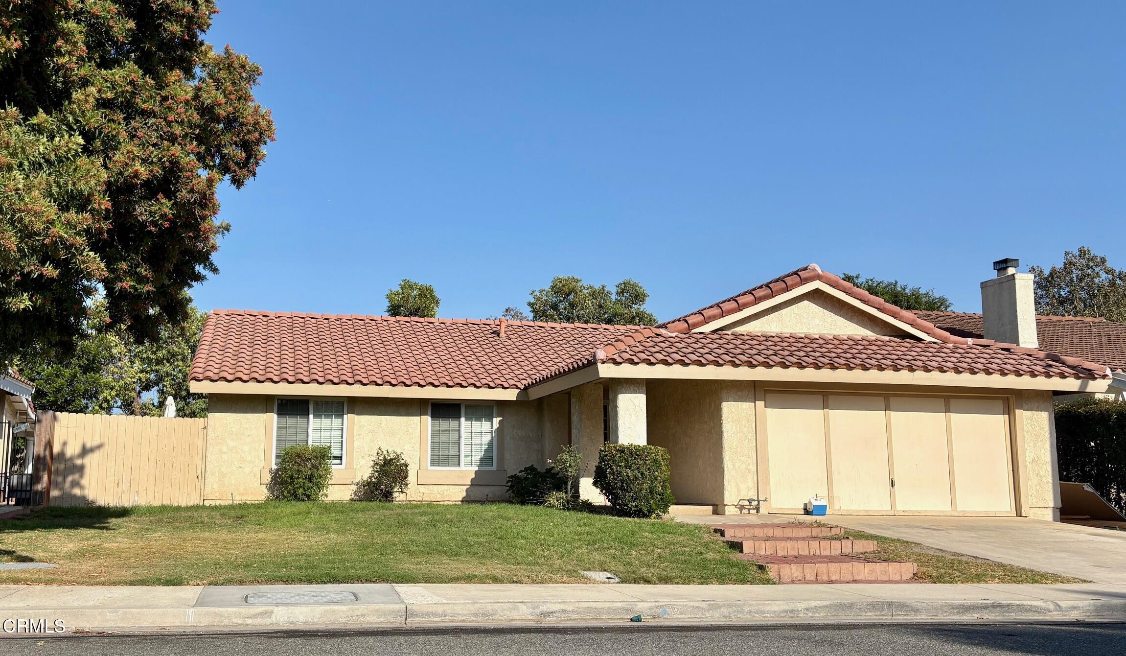 4736 Talmadge Road Moorpark, CA 93021 - Photo 1 of 1 a front view of a house with a yard