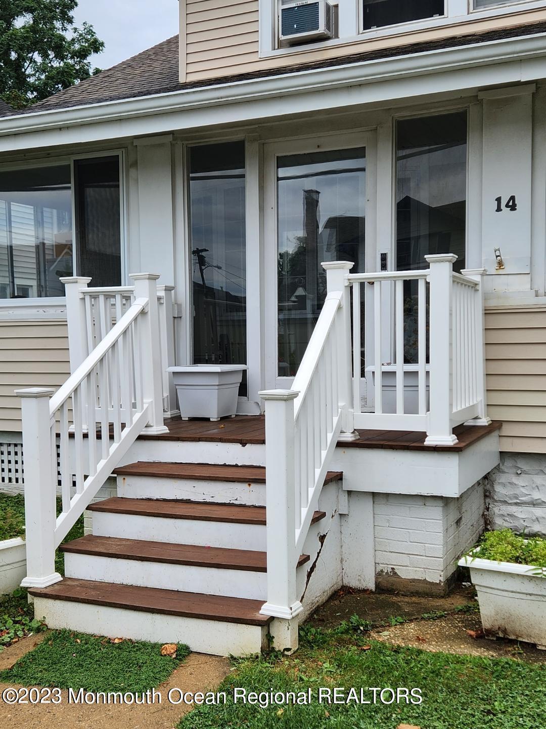 14 Grove Street Long Branch, NJ 07740 - Photo 2 of 21 a view of a building with stairs