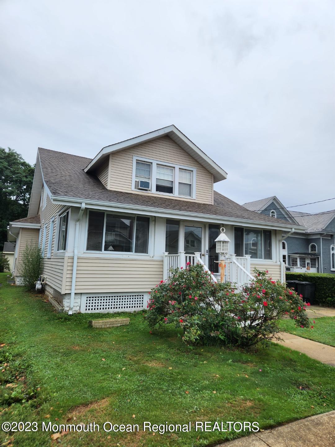 14 Grove Street Long Branch, NJ 07740 - Photo 3 of 21 a front view of a house with a yard