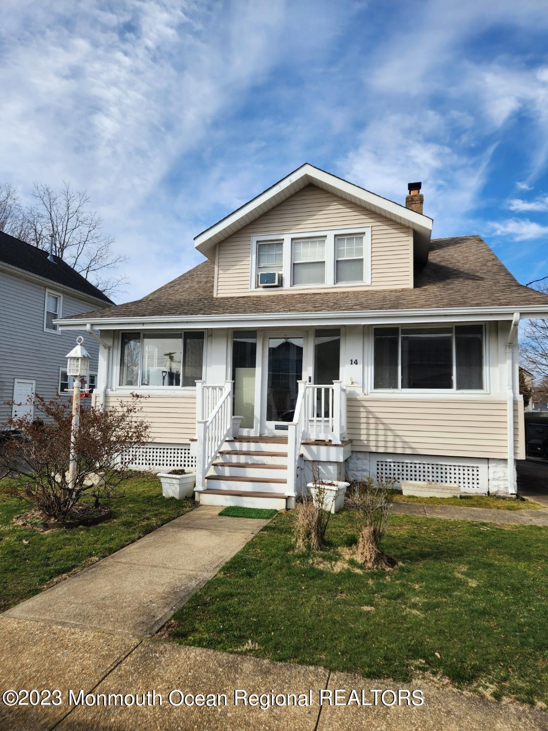 14 Grove Street Long Branch, NJ 07740 - Photo 4 of 21 a front view of a house with a yard