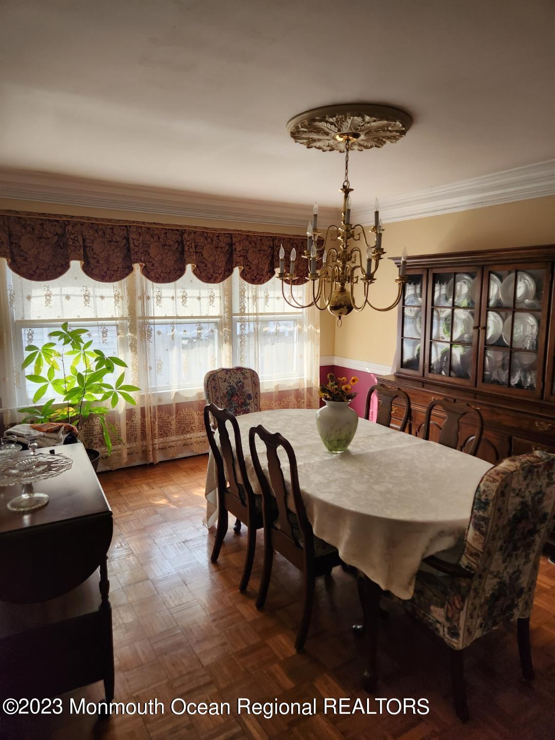 14 Grove Street Long Branch, NJ 07740 - Photo 8 of 21 a view of a dining room with furniture and window