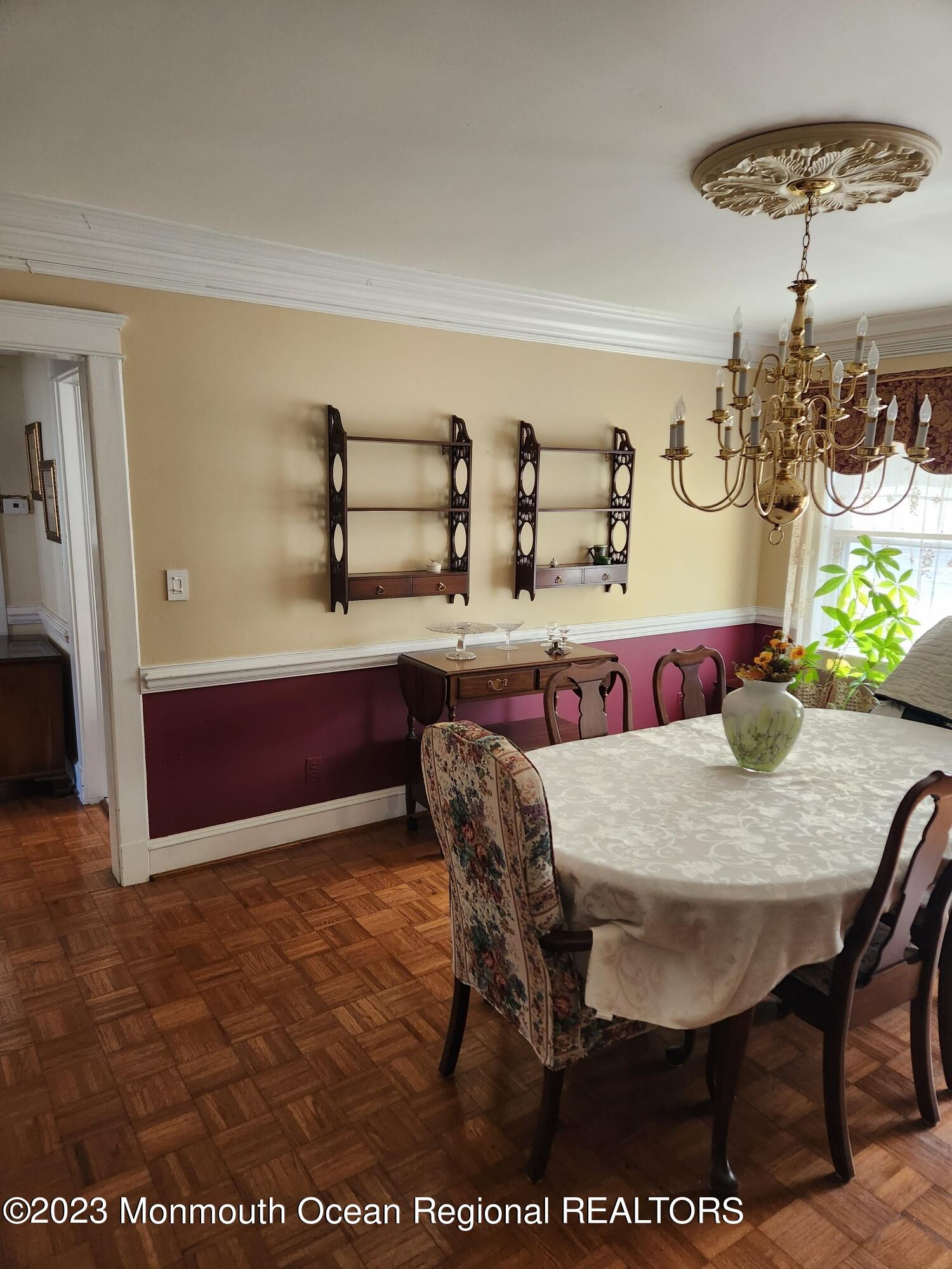 14 Grove Street Long Branch, NJ 07740 - Photo 9 of 21 a view of a dining room with furniture