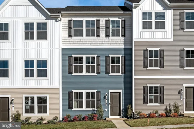 a front view of a building with windows
