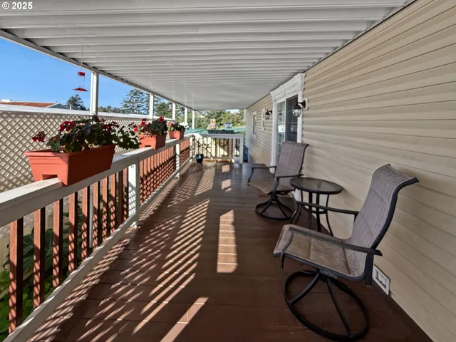 a view of a chairs and table in patio